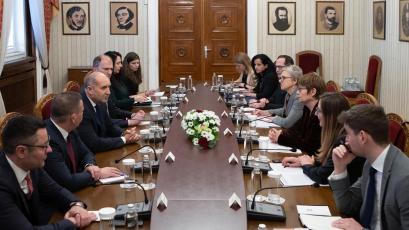 The promotion of investments in expanding transport connectivity and in